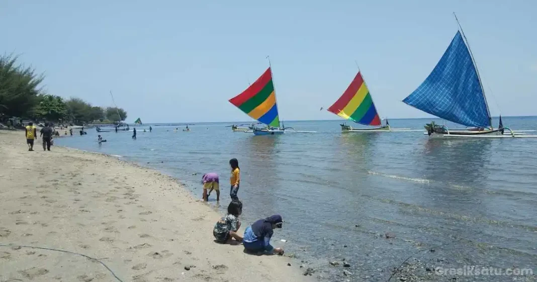 pemandangan indah pantai pasir putih situbondo dengan pasir putih dan laut biru